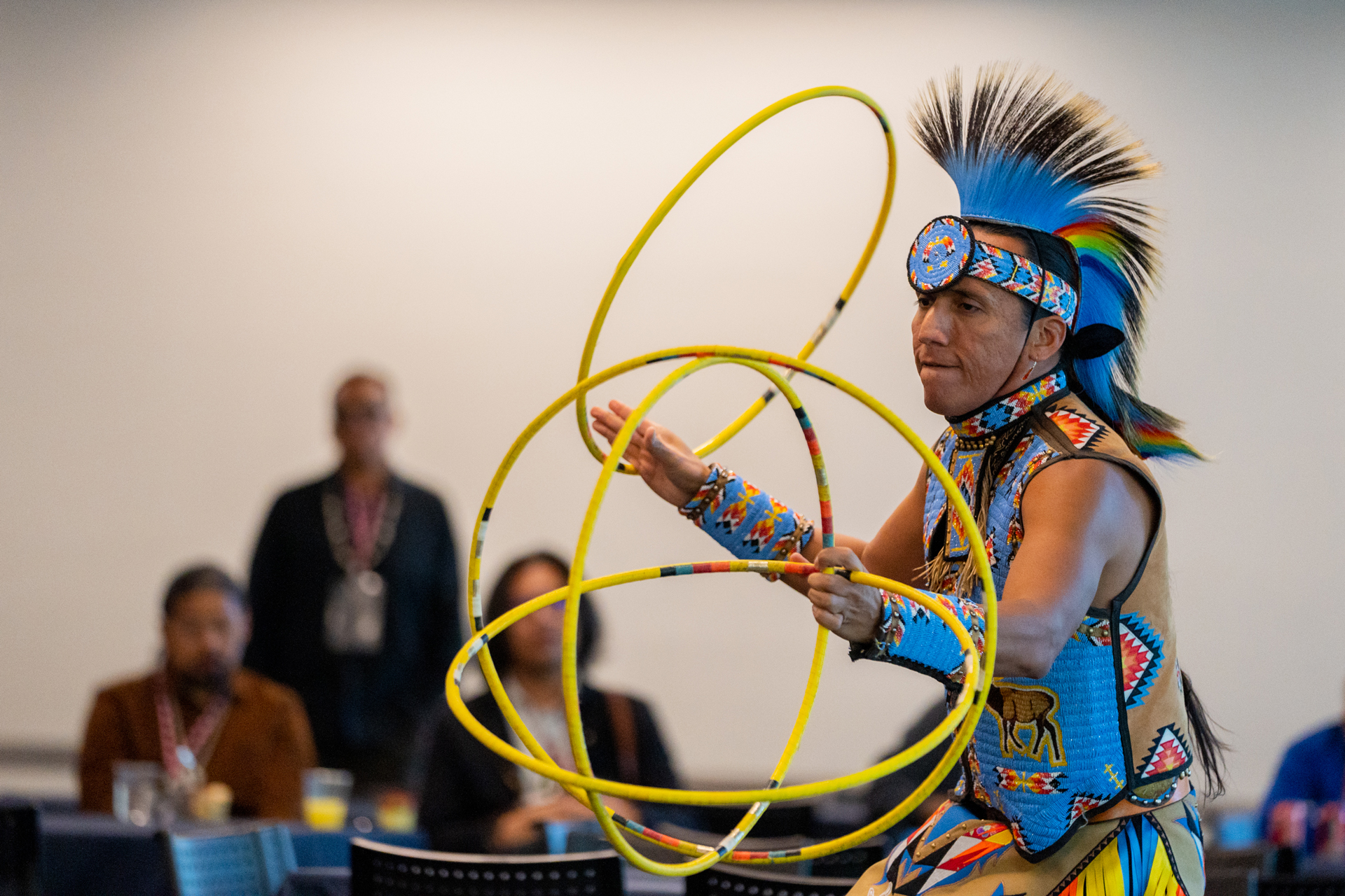 Hoop dancer Tony Duncan performing at the conference