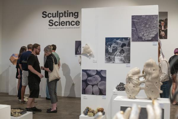 People conversating at Scultping Science 