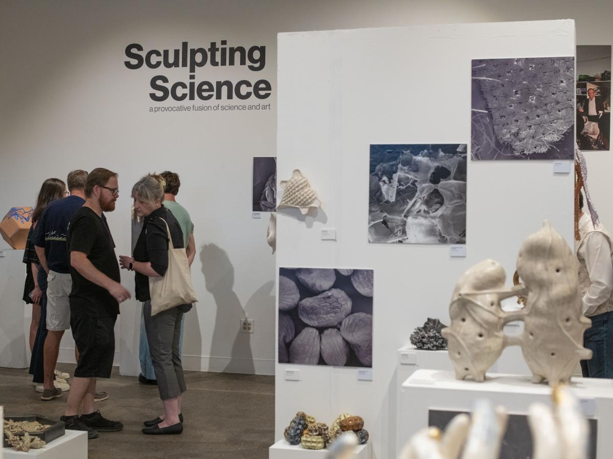 People conversating at Scultping Science 
